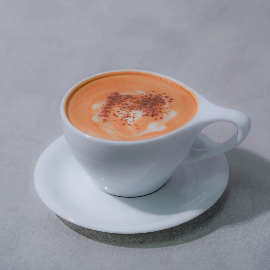 Freshly brewed coffee in a white cup